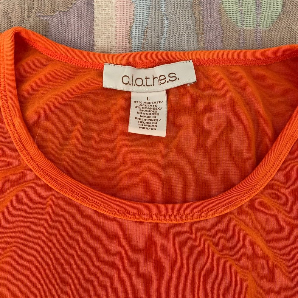 Great deep orange color "flowy" stretchy material